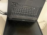 a laptop computer sitting on top of a desk