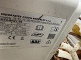 a label on the side of a machine that is sitting on the ground