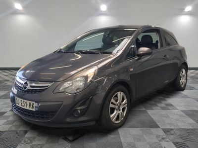 a picture of a grey car parked in a garage