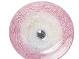 a pink and white ball of yarn on a white surface
