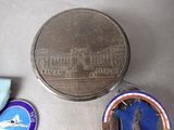some medals and a medal are sitting on a table