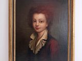 portrait of a young man in a red dress with a ruffled collar