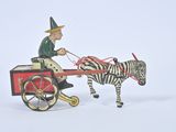toy figurine of a man riding in a horse drawn carriage with a zebra