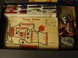 a toy train set in a box on a table