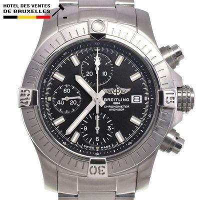 a picture of a stainless steel watch with a black dial