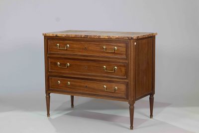 an image of a wooden chest of drawers with marble top