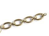 an image of a close up of a wrist watch on a chain