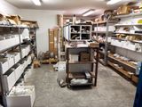 a room filled with lots of boxes and shelves