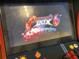 a video game machine that is on display in a room