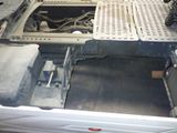 a picture of the inside of a car with the door open