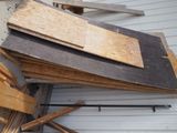 a pile of wood sitting on top of a building