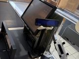 a desk with a laptop and a monitor on it