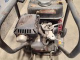 a close up of a small engine on the ground