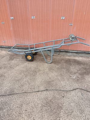 an image of a hand truck with a trailer attached to it