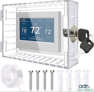 an image of a digital thermostar with a key