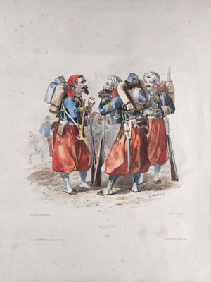 two men dressed in medieval clothing standing next to each other