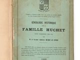 un livre ouvert sur lequel figure un blason