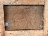 a picture of an old wooden frame with a hole in it