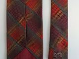 two neck ties with a red and brown plaid pattern