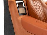 a car seat with a cell phone in it