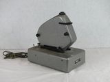 a gray object that is sitting on top of a table
