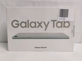 the box of the samsung tab is open on a white surface