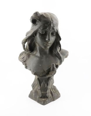 sculpture of a woman ' s head on a bust on a white background