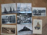 many old photos of people on a table