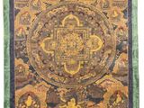 une thangka tibétaine verte et dorée, ornée d'un motif circulaire