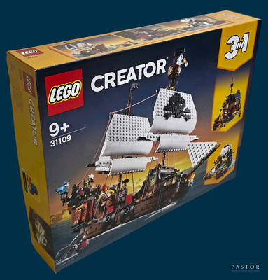 a box that has a lego pirate ship in it