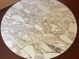 a marble table top on a wooden table