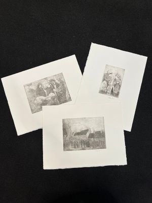 four black and white pictures of people on a black surface