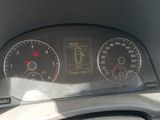 a close up of a car dashboard with a speedometer and gauges