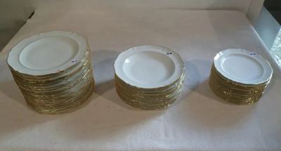 four plates stacked on top of each other on a table