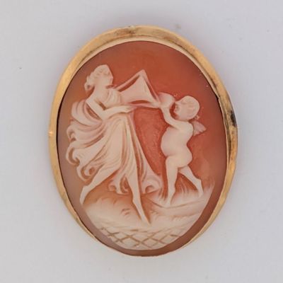 la photo d'une photo représentant une femme et un enfant dans un coquillage
