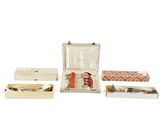 several different items in a case on a white surface