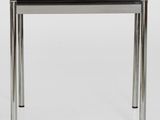 a close up of a table with a black top on a white background