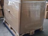 a large box sitting on a pallet in a warehouse