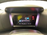 a car dashboard with a digital display on it