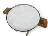 an overhead view of a table with a marble top and wooden legs