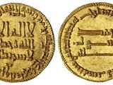 une pièce d'or portant l'image d'un homme et d'une femme