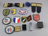 a lot of military patches and patches on a table