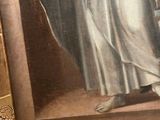 an old painting of a man holding a dog in his arms
