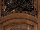 a large wooden door with a decorative design on it