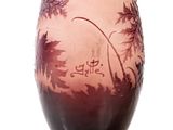a vase that has a design on the side of it