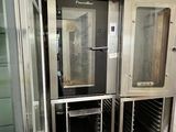 two ovens that are sitting in a room
