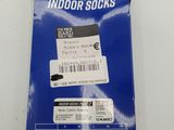 a close up of a package of socks on a white surface