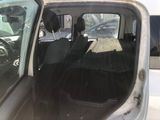 an image of the inside of a car with the door open