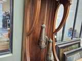 a grandfather clock that is on display in a store