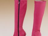 pair of pink high heeled boots on a white background